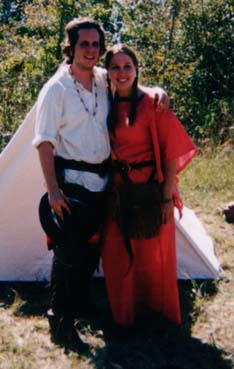 Paul and Melissa in front of a wedge tent